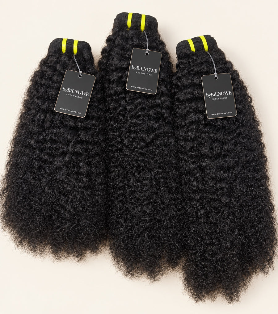 Three byBilngwe 4C textured bundles with black extension tags on an ivory background