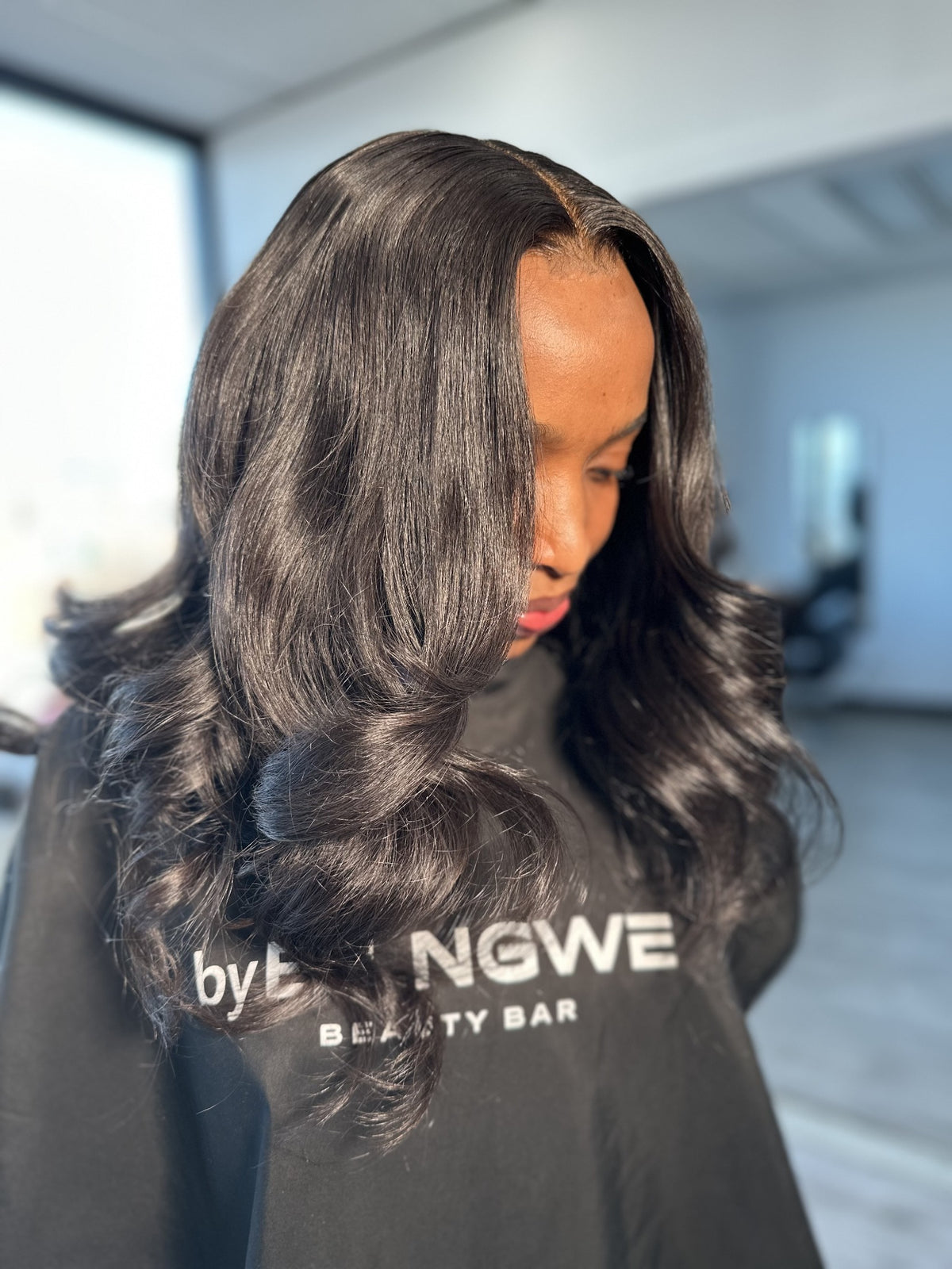 Client wearing installed Body Wave bundles