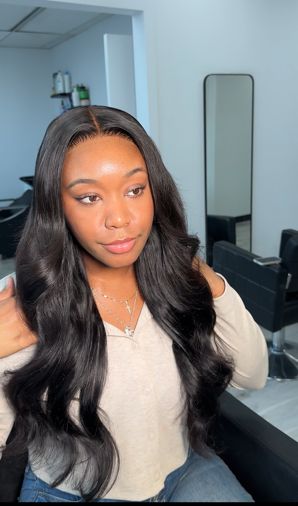 Client wearing installed Body Wave bundles