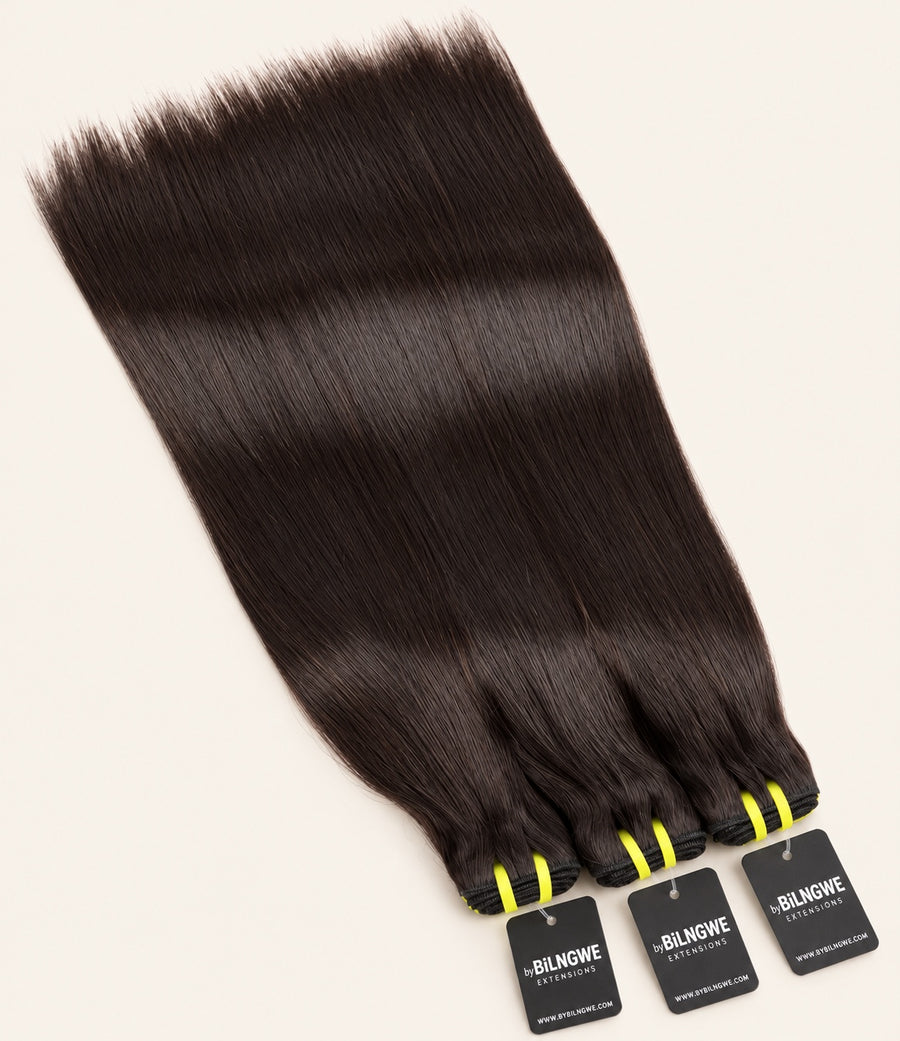 Three byBilngwe Straight bundles laid flat with black extension tags
